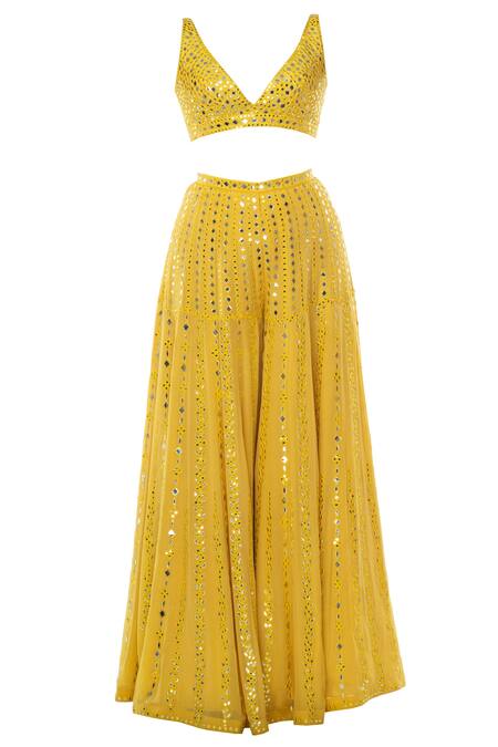 Shop Tamanna Punjabi Kapoor Yellow Georgette V Neck Embroidered Sharara With Cape Set Online at Aza Fashions Shop_Tamanna Punjabi Kapoor_Yellow Georgette V Neck Embroidered Sharara With Cape Set _Online_at_Aza_Fashions