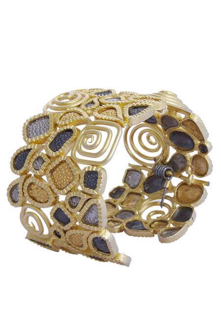 Shop Mira By Radhika Jain Gold Plated Metal Carved Handcuff at Aza Fashions Shop_Mira By Radhika Jain_Gold Plated Metal Carved Handcuff_at_Aza_Fashions