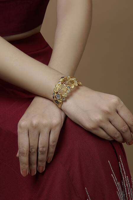 Buy_Mira By Radhika Jain_Gold Plated Metal Carved Bracelet_Online_at_Aza_Fashions