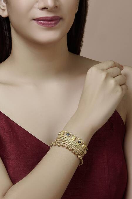 Mira By Radhika Jain Gold Plated Metal Carved Bracelet