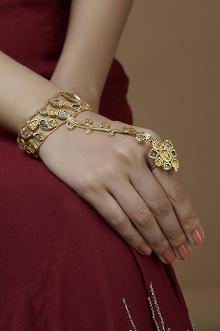 Buy_Mira By Radhika Jain_Gold Plated Metal Carved Hathphool_Online_at_Aza_Fashions