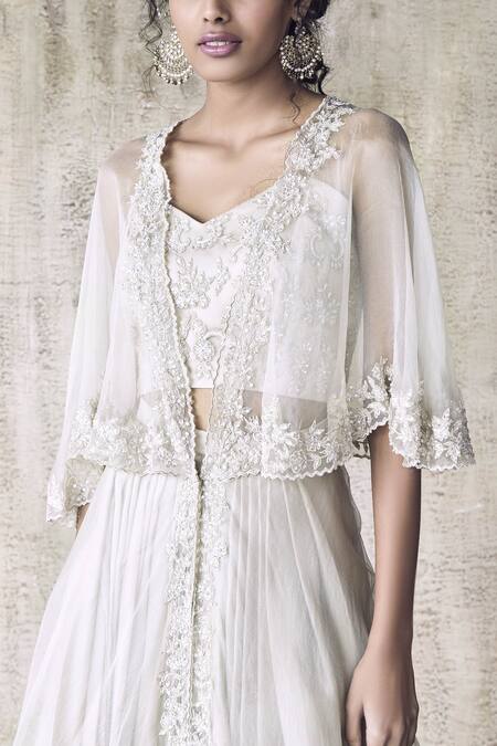 Buy Himani & Anjali Shah Beige Net Embroidered Cape Lehenga Set Online at Aza Fashions Buy_Himani & Anjali Shah_Beige Net Embroidered Cape Lehenga Set_Online_at_Aza_Fashions