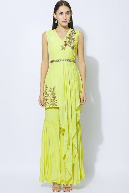 NIDHIKA SHEKHAR_Yellow Crepe, Georgette, Shantoon Lining V-shaped Asymmetric Kurta Sharara Set _Online_at_Aza_Fashions