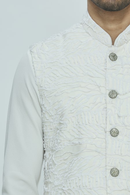 Nautanky White Korean Polyester Textured Bundi Kurta Set at Aza Fashions Nautanky_White Korean Polyester Textured Bundi Kurta Set _at_Aza_Fashions