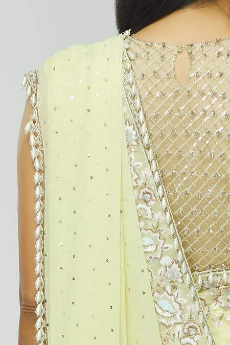 Avvantikaa S Parwani_Yellow Georgette Embellished Saree With Blouse_at_Aza_Fashions