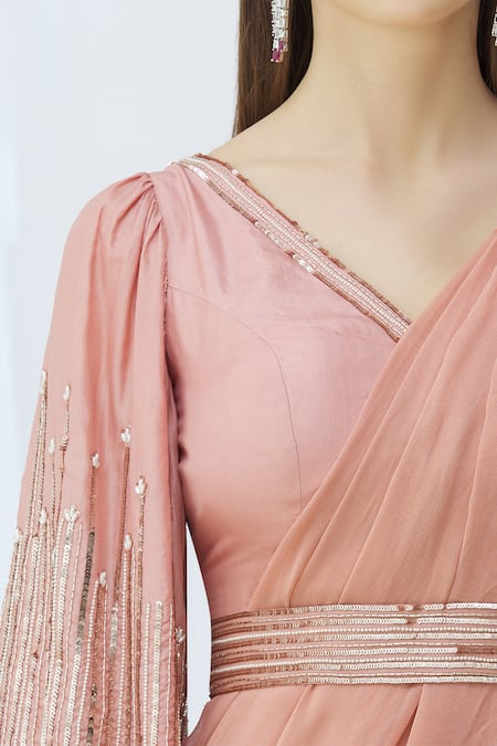 Chhavvi Aggarwal_Pink Silk, Georgette V Neck Embellished Pre-draped Saree_at_Aza_Fashions
