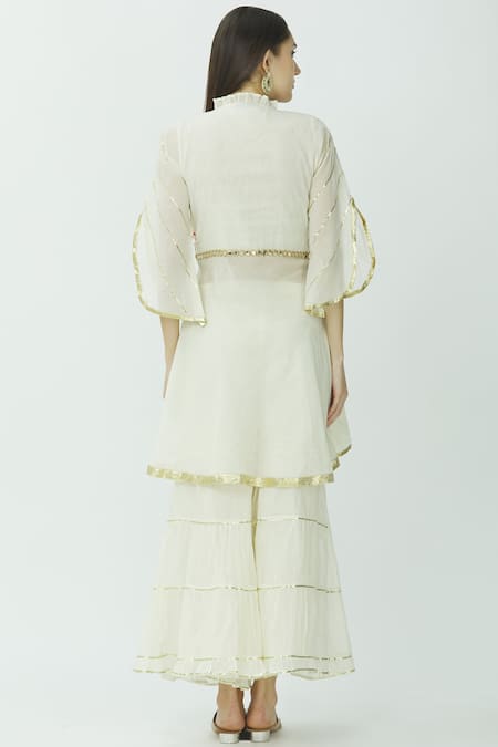 Shop Kunwarani Ritu White Mulmul Round Embroidered Kurta Sharara Set at Aza Fashions Shop_Kunwarani Ritu_White Mulmul Round Embroidered Kurta Sharara Set _at_Aza_Fashions