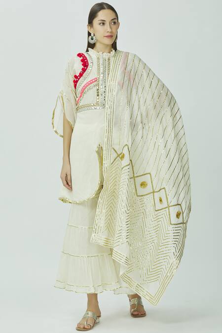 Kunwarani Ritu White Mulmul Round Embroidered Kurta Sharara Set Online at Aza Fashions Kunwarani Ritu_White Mulmul Round Embroidered Kurta Sharara Set _Online_at_Aza_Fashions