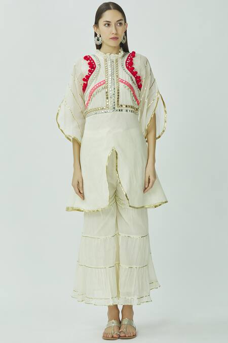 Buy Kunwarani Ritu White Mulmul Round Embroidered Kurta Sharara Set Online at Aza Fashions Buy_Kunwarani Ritu_White Mulmul Round Embroidered Kurta Sharara Set _Online_at_Aza_Fashions