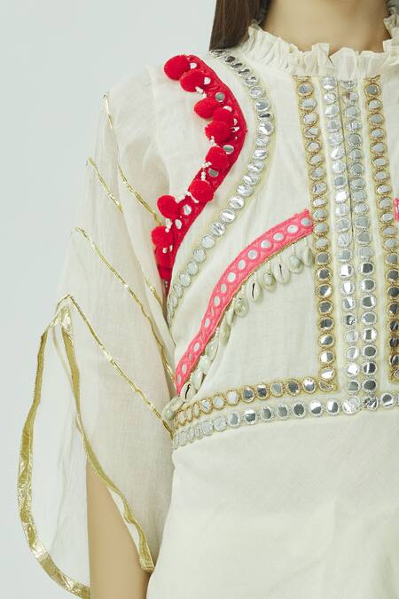 Kunwarani Ritu White Mulmul Round Embroidered Kurta Sharara Set at Aza Fashions Kunwarani Ritu_White Mulmul Round Embroidered Kurta Sharara Set _at_Aza_Fashions