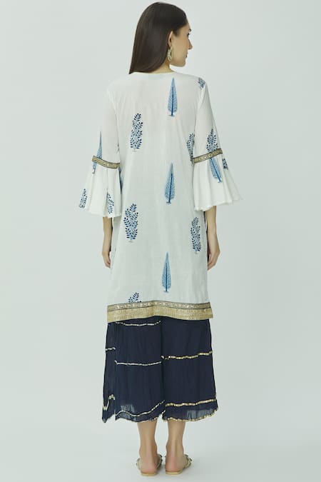 Shop Kunwarani Ritu White Mulmul Notched Embellished Kurta Sharara Set at Aza Fashions Shop_Kunwarani Ritu_White Mulmul Notched Embellished Kurta Sharara Set _at_Aza_Fashions