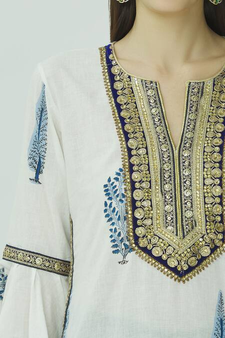 Kunwarani Ritu White Mulmul Notched Embellished Kurta Sharara Set at Aza Fashions Kunwarani Ritu_White Mulmul Notched Embellished Kurta Sharara Set _at_Aza_Fashions