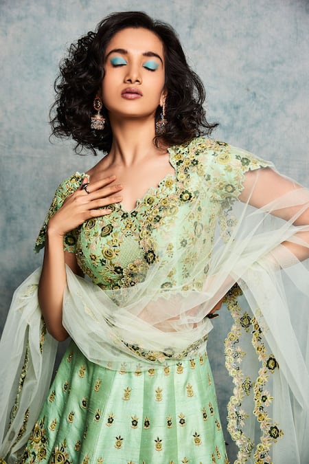 Shop Nadima Saqib Green Raw Silk, Tulle Net Leaf Neck Embroidered Lehenga Set at Aza Fashions Shop_Nadima Saqib_Green Raw Silk, Tulle Net Leaf Neck Embroidered Lehenga Set _at_Aza_Fashions