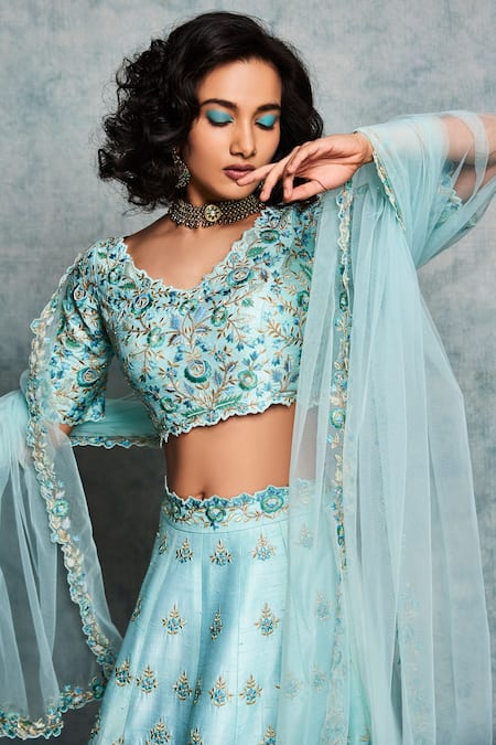 Shop Nadima Saqib Blue Raw Silk, Tulle Net V Neck Embroidered Lehenga Set at Aza Fashions Shop_Nadima Saqib_Blue Raw Silk, Tulle Net V Neck Embroidered Lehenga Set _at_Aza_Fashions