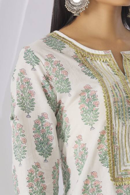 Amrita Artisanal Clothing_White Mul Mul Embellished Kurta Dhoti Pant Set_at_Aza_Fashions