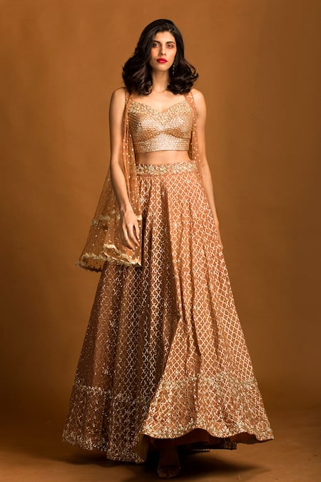 Shop Izzumi Mehta Gold Blouse And Lehenga Chanderi Jacket Net Zardozi Embroidered Set at Aza Fashions Shop_Izzumi Mehta_Gold Blouse And Lehenga Chanderi Jacket Net Zardozi Embroidered Set _at_Aza_Fashions
