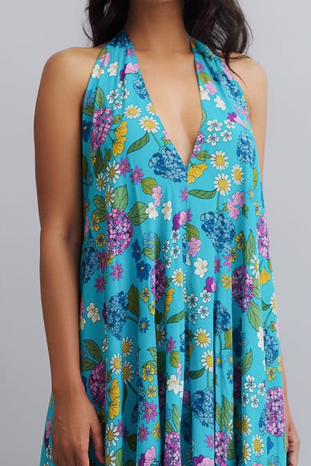 Nautanky Blue Viscose Crepe Floral Halter Print Asymmetric Dress at Aza Fashions Nautanky_Blue Viscose Crepe Floral Halter Print Asymmetric Dress _at_Aza_Fashions