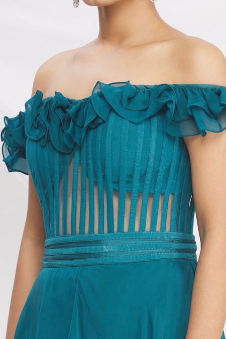 Nitika Kanodia Gupta_Blue Draped Off Shoulder Jumpsuit_at_Aza_Fashions