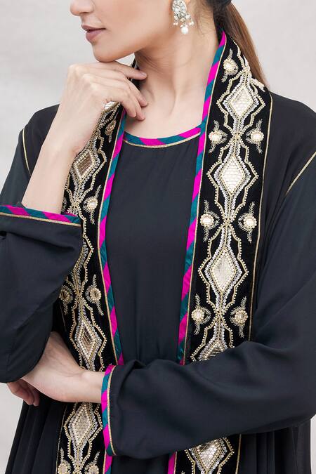 Ekta Singh Black Georgette Round Asymmetric Cape And Dhoti Pant Set at Aza Fashions Ekta Singh_Black Georgette Round Asymmetric Cape And Dhoti Pant Set _at_Aza_Fashions