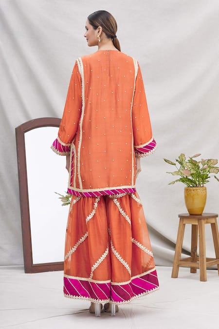 Shop Ekta Singh Orange Silk Round Kurta Sharara Set at Aza Fashions Shop_Ekta Singh_Orange Silk Round Kurta Sharara Set _at_Aza_Fashions