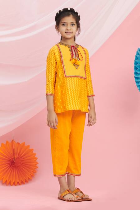 Nikasha_Orange Cotton Tassels, Embroidery Kurta And Pant Set _Online_at_Aza_Fashions