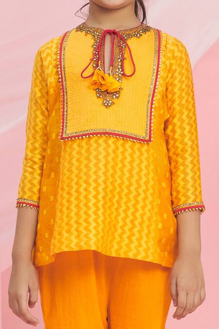 Nikasha_Orange Cotton Tassels, Embroidery Kurta And Pant Set _at_Aza_Fashions