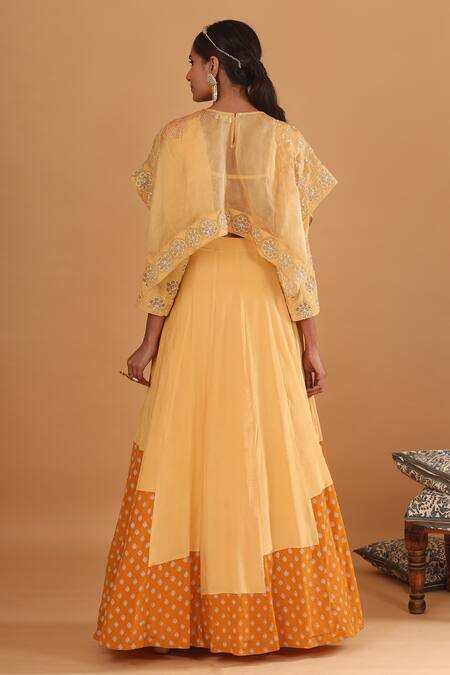 Shop EK Soot Yellow Crepe Round Embroidered Cape And Lehenga Set at Aza Fashions Shop_EK Soot_Yellow Crepe Round Embroidered Cape And Lehenga Set_at_Aza_Fashions
