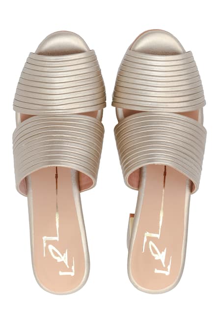 Shop Nidhi Bhandari Gold Cutout Strap Block Heels at Aza Fashions Shop_Nidhi Bhandari_Gold Cutout Strap Block Heels _at_Aza_Fashions