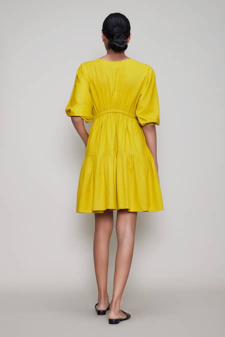 Shop MATI_1 Yellow Cotton V Neck Flared Dress at Aza Fashions Shop_MATI_1_Yellow Cotton V Neck Flared Dress _at_Aza_Fashions