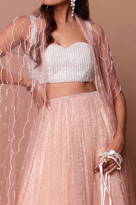 Shop Shehlaa Khan Beige Tulle Sweetheart Neck Embroidered Lehenga Set at Aza Fashions Shop_Shehlaa Khan_Beige Tulle Sweetheart Neck Embroidered Lehenga Set _at_Aza_Fashions