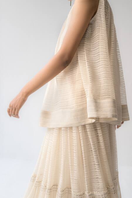 Urvashi Kaur_White Linen Embroidery Round Neck Flared Sleeveless Top _Online_at_Aza_Fashions