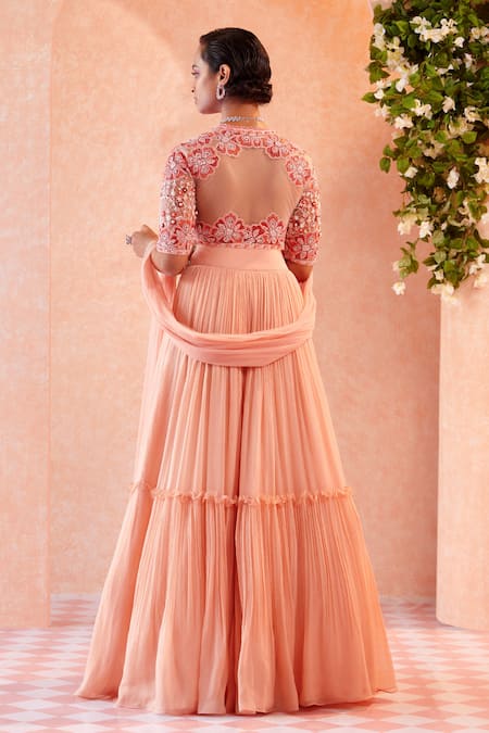 Shop Ridhi Mehra Peach Blouse Lehenga Chiffon Dupatta Suzzone Tiered Bridal Set at Aza Fashions Shop_Ridhi Mehra_Peach Blouse Lehenga Chiffon Dupatta Suzzone Tiered Bridal Set _at_Aza_Fashions