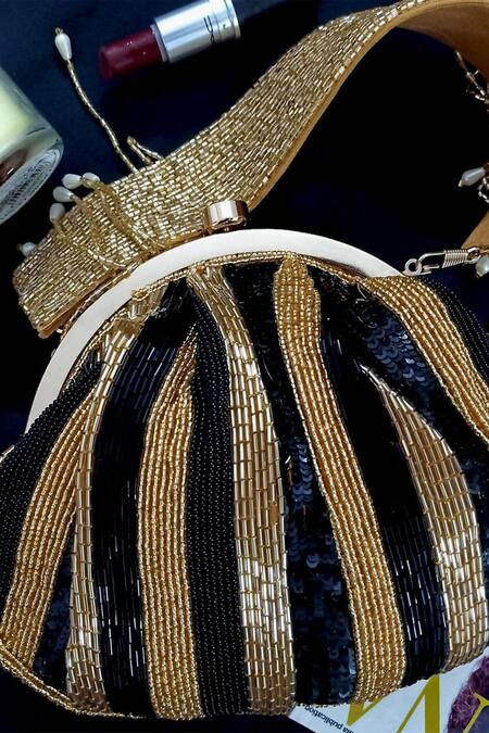 Buy A Clutch Story Gold Embroidery Silk Pouch Clutch Online at Aza Fashions Buy_A Clutch Story_Gold Embroidery Silk Pouch Clutch _Online_at_Aza_Fashions