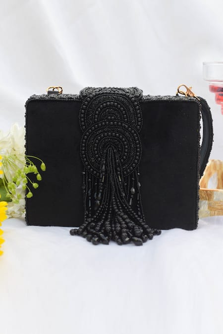 Shop Eena Black Embroidered Erisha Tassel Clutch With Sling at Aza Fashions Shop_Eena_Black Embroidered Erisha Tassel Clutch With Sling _at_Aza_Fashions