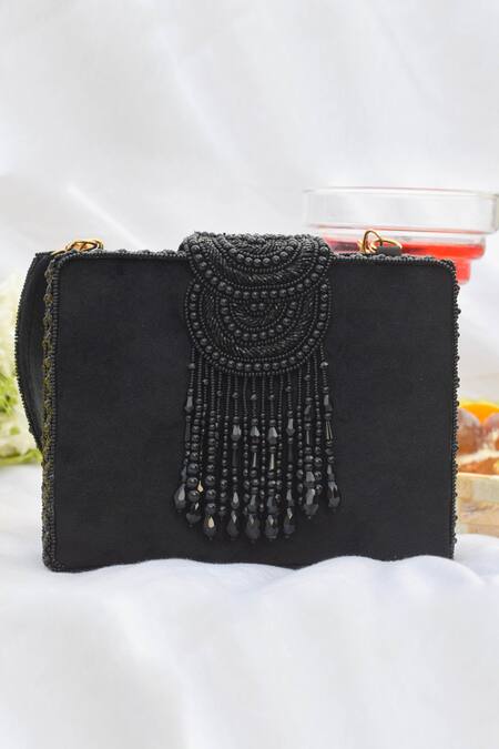 Eena Black Embroidered Erisha Tassel Clutch With Sling Online at Aza Fashions Eena_Black Embroidered Erisha Tassel Clutch With Sling _Online_at_Aza_Fashions