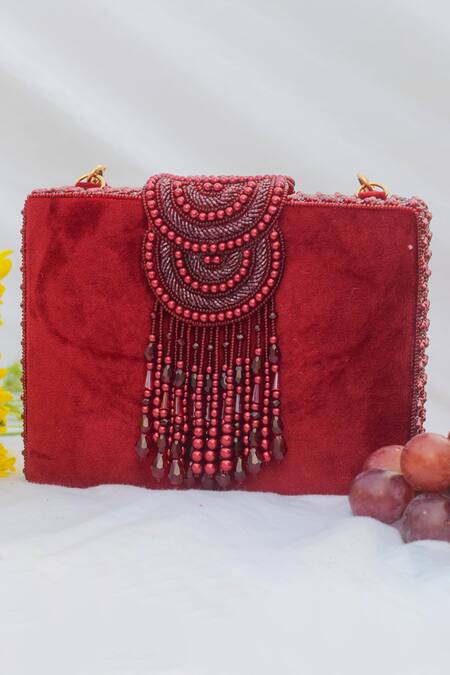 Shop Eena Red Embroidered Erisha Tassel Clutch With Sling at Aza Fashions Shop_Eena_Red Embroidered Erisha Tassel Clutch With Sling _at_Aza_Fashions