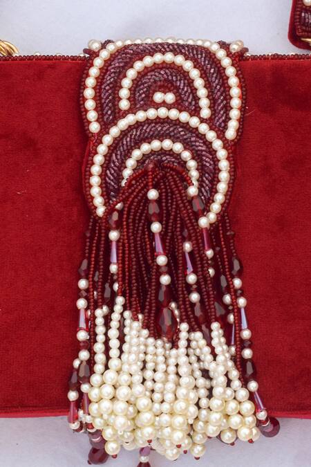 Eena Red Embroidered Erisha Tassel Clutch With Sling Online at Aza Fashions Eena_Red Embroidered Erisha Tassel Clutch With Sling _Online_at_Aza_Fashions