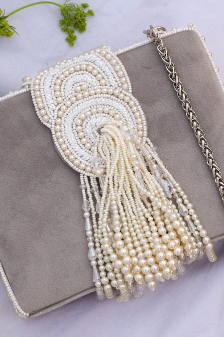 Shop Eena Grey Embroidered Erisha Tassel Clutch With Sling at Aza Fashions Shop_Eena_Grey Embroidered Erisha Tassel Clutch With Sling _at_Aza_Fashions