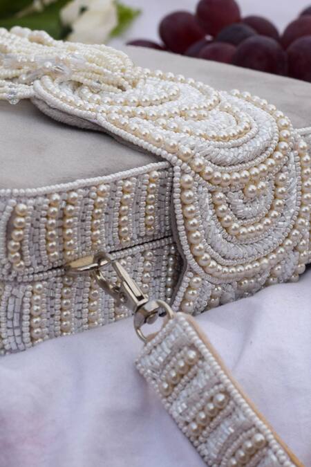 Eena Grey Embroidered Erisha Tassel Clutch With Sling Online at Aza Fashions Eena_Grey Embroidered Erisha Tassel Clutch With Sling _Online_at_Aza_Fashions