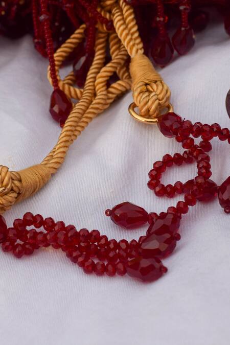 Eena Red Embroidery, Beads, Sequins Shayna Tassel Potli Bag Online at Aza Fashions Eena_Red Embroidery, Beads, Sequins Shayna Tassel Potli Bag _Online_at_Aza_Fashions