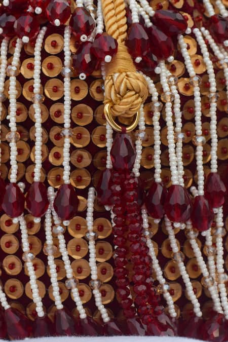 Shop Eena Red Embroidered Shayna Bead Tassel Potli Bag at Aza Fashions Shop_Eena_Red Embroidered Shayna Bead Tassel Potli Bag _at_Aza_Fashions