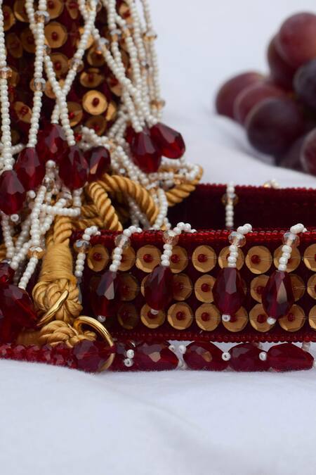 Eena Red Embroidered Shayna Bead Tassel Potli Bag Online at Aza Fashions Eena_Red Embroidered Shayna Bead Tassel Potli Bag _Online_at_Aza_Fashions