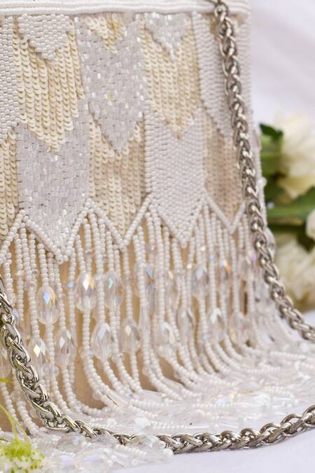 Eena White Embroidered Dishi Tassel Clutch With Sling Online at Aza Fashions Eena_White Embroidered Dishi Tassel Clutch With Sling _Online_at_Aza_Fashions