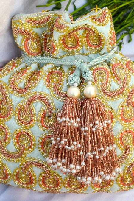 Shop Eena Blue Embroidered Deleena Velvet Potli Bag at Aza Fashions Shop_Eena_Blue Embroidered Deleena Velvet Potli Bag _at_Aza_Fashions