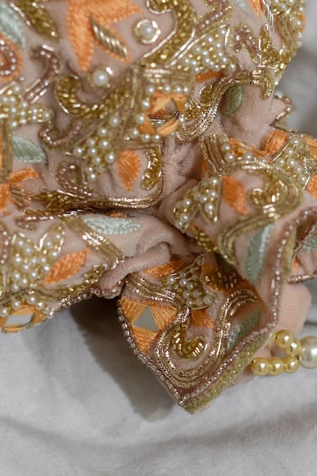 Shop Eena Pink Embroidery, Beads, Mirrors Heli Velvet Potli Bag at Aza Fashions Shop_Eena_Pink Embroidery, Beads, Mirrors Heli Velvet Potli Bag _at_Aza_Fashions