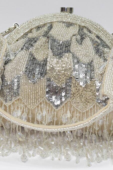 Buy Eena Silver Embroidered Hrutvy Bead Tassel Clutch Online at Aza Fashions Buy_Eena_Silver Embroidered Hrutvy Bead Tassel Clutch _Online_at_Aza_Fashions