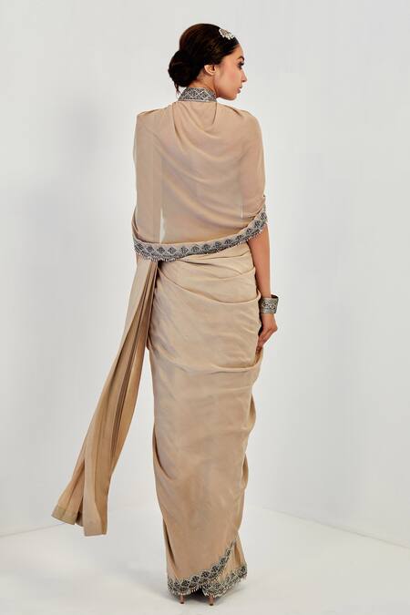 Shop Rishi And Soujit Beige Organza, Crepe, Lycra Blouse Sweetheart Cape Pre-draped Saree And Set at Aza Fashions Shop_Rishi And Soujit_Beige Organza, Crepe, Lycra Blouse Sweetheart Cape Pre-draped Saree And Set _at_Aza_Fashions