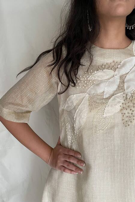 Chambray & CO. White Cotton, Chanderi With Zari Stripes Round Embroidered Tunic Pants at Aza Fashions Chambray & CO._White Cotton, Chanderi With Zari Stripes Round Embroidered Tunic Pants _at_Aza_Fashions