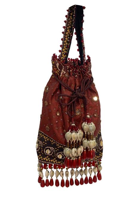 Buy The Garnish Company Maroon Embroidered Mujal Bandhej Tassel Potli Bag Online at Aza Fashions Buy_The Garnish Company_Maroon Embroidered Mujal Bandhej Tassel Potli Bag _Online_at_Aza_Fashions
