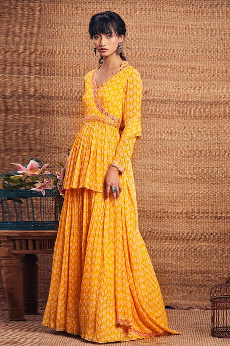 Aneesh Agarwaal_Yellow Georgette V Neck Peplum Kurta And Skirt Set _Online_at_Aza_Fashions